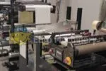 Rotoflex slitter-rewinder for label.